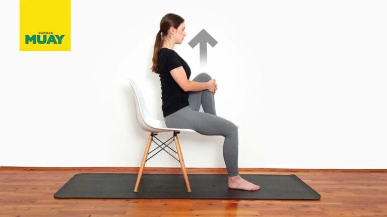 Estiramiento de rodilla al pecho sentado